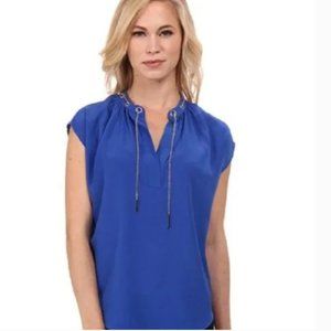 Michael Kors blue blouse with grommets and chain